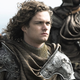 Finn Jones como Ser Loras Tyrell en la serie Juego de Tronos.